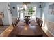 This dining room has a large window with beautiful views at 215 Collins Rd, Lillington, NC 27546