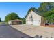 Two car garage with a balcony and attached carport near the lake at 215 Collins Rd, Lillington, NC 27546