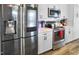 Modern kitchen featuring stainless steel appliances, white cabinets, and beautiful countertops at 215 Collins Rd, Lillington, NC 27546