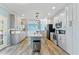 Spacious kitchen with modern appliances, sleek countertops, and a center island, great for entertaining at 215 Collins Rd, Lillington, NC 27546