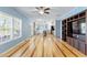 Open-concept design showcasing a modern kitchen view from the light-filled living room at 215 Collins Rd, Lillington, NC 27546