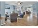 This wide view shows the living room connected to a kitchen and dining area at 215 Collins Rd, Lillington, NC 27546