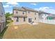 Lush backyard with patio, perfect for outdoor gatherings and relaxation at 220 Outwater Ridge Dr, Garner, NC 27529