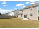 Spacious backyard with patio area, ideal for entertaining or relaxing outdoors at 220 Outwater Ridge Dr, Garner, NC 27529