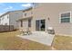 Backyard patio with grill and seating, great for outdoor cooking and dining at 220 Outwater Ridge Dr, Garner, NC 27529