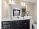 Bathroom with double sink vanity and framed mirror at 220 Outwater Ridge Dr, Garner, NC 27529
