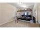 Bedroom featuring a bunkbed with futon and gray carpeting at 220 Outwater Ridge Dr, Garner, NC 27529