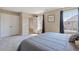Cozy bedroom with en-suite bathroom access and ample natural light at 220 Outwater Ridge Dr, Garner, NC 27529