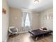 Bright bedroom featuring a futon, gray carpeting and modern decor at 220 Outwater Ridge Dr, Garner, NC 27529