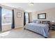 Spacious bedroom with two windows and neutral carpet at 220 Outwater Ridge Dr, Garner, NC 27529
