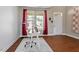 Charming home office featuring natural light, desk, chair, and a view of the home's exterior at 220 Outwater Ridge Dr, Garner, NC 27529