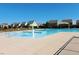Community pool with mushroom water feature and a covered seating area at 220 Outwater Ridge Dr, Garner, NC 27529