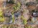 Overhead view showcasing the property's placement among lush landscaping and surrounding homes in a peaceful neighborhood at 2224 Clements Dr, Durham, NC 27704