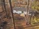 Aerial view of back of house with back yard featuring fire pit at 2224 Clements Dr, Durham, NC 27704