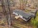 Aerial view of the house highlighting mature trees at 2224 Clements Dr, Durham, NC 27704