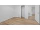 Minimalist bedroom featuring wood-look floors, closet and neutral walls at 2224 Clements Dr, Durham, NC 27704
