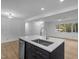 A modern kitchen island with stainless steel sink, pendant lighting, and plenty of space at 2224 Clements Dr, Durham, NC 27704