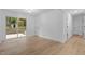 An open living room features lots of light with modern floors and neutral paint at 2224 Clements Dr, Durham, NC 27704