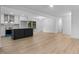 An open-concept layout seamlessly connects the kitchen and living areas. Modern design at 2224 Clements Dr, Durham, NC 27704