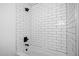 A clean, bright shower is highlighted by subway tile at 2224 Clements Dr, Durham, NC 27704