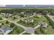 Aerial view of a residential area showcasing the landscape, houses, and surrounding environment at 25 Westbourne Ln, Youngsville, NC 27596
