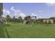 Well-maintained backyard with lawn and trees, offering a private outdoor space for recreation and relaxation at 25 Westbourne Ln, Youngsville, NC 27596