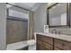 Bathroom with a shower and tub combination, complete with modern fixtures and a vanity at 25 Westbourne Ln, Youngsville, NC 27596