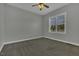 A neutral bedroom with carpet, fan and a window to provide light at 25 Westbourne Ln, Youngsville, NC 27596