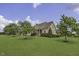 Beautiful home featuring a spacious lawn and mature trees at 25 Westbourne Ln, Youngsville, NC 27596