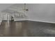 Huge living room with a bar and wood floors at 25 Westbourne Ln, Youngsville, NC 27596