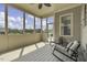 Enclosed patio featuring lots of natural light and views of the surrounding landscape at 25 Westbourne Ln, Youngsville, NC 27596