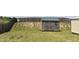 Spacious backyard with a privacy fence, storage shed, and grassy lawn at 259 Brassfield Dr, Burlington, NC 27217