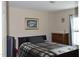 Bedroom featuring a bed, dresser, and a calming atmosphere at 259 Brassfield Dr, Burlington, NC 27217