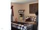 Bedroom boasts comfortable bed, mirror, and unique decor at 259 Brassfield Dr, Burlington, NC 27217