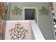 Hallway features a staircase and wooden decoration hung on the wall at 259 Brassfield Dr, Burlington, NC 27217