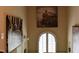 Hallway features train and abstract paintings and window with shutter detail at 259 Brassfield Dr, Burlington, NC 27217