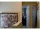 Hallway with doorway leading to a room with desk at 259 Brassfield Dr, Burlington, NC 27217