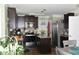 View of kitchen with granite counters, island, and stainless steel appliances at 259 Brassfield Dr, Burlington, NC 27217