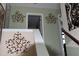 Upward view of staircase with interior decor and white railings at 259 Brassfield Dr, Burlington, NC 27217
