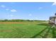 A sprawling green backyard is surrounded by a wood fence at 2775 Eagles Roost Trl, Burlington, NC 27217