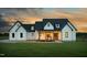 Charming exterior view of home featuring covered porch and craftsman style windows at 2775 Eagles Roost Trl, Burlington, NC 27217