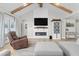 Comfortable living room with fireplace, vaulted ceilings, and inviting decor at 2775 Eagles Roost Trl, Burlington, NC 27217