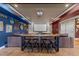 Finished basement with theater seating, a large projector screen, and custom decor, perfect for movie nights at 2820 Charleston Oaks Dr, Raleigh, NC 27614