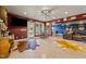Finished basement featuring a bar area, wine barrels, and ample space for entertainment at 2820 Charleston Oaks Dr, Raleigh, NC 27614