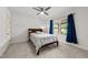 Bright bedroom with a comfortable bed, soft carpet, and a window view, creating a relaxing atmosphere at 2820 Charleston Oaks Dr, Raleigh, NC 27614