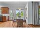 Bright breakfast nook with views, a chandelier, and stylish wicker chairs at 2820 Charleston Oaks Dr, Raleigh, NC 27614