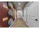 Finished hallway with decorative wine barrels and dart board, providing access to multiple rooms at 2820 Charleston Oaks Dr, Raleigh, NC 27614