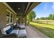 Spacious patio with lounge seating and golf course views at 2820 Charleston Oaks Dr, Raleigh, NC 27614