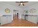 Sitting room features built-in cabinets and easy access to other areas of the home at 2820 Charleston Oaks Dr, Raleigh, NC 27614