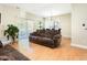 Inviting living room with sliding door access, adjacent to dining area, creating an open flow at 300 Sugar Maple Ave, Wake Forest, NC 27587
